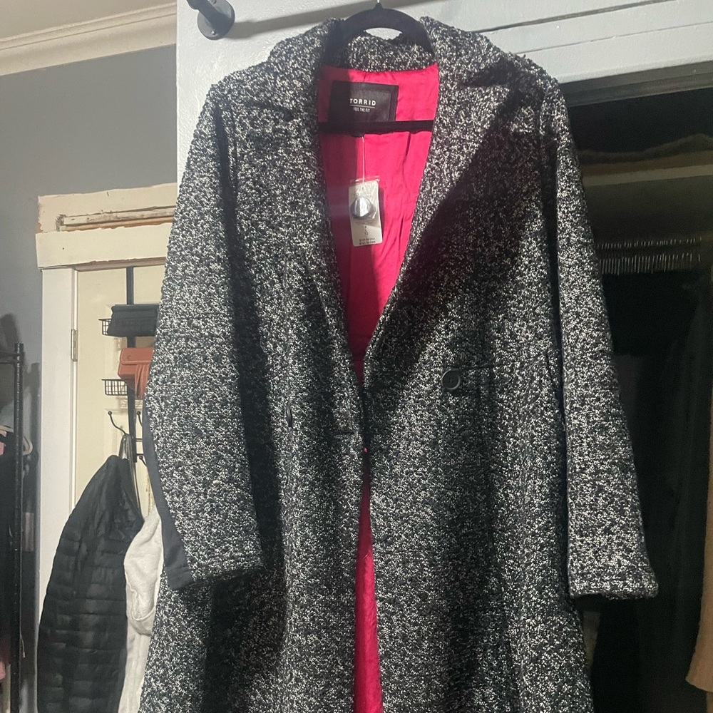 Torrid winter jacket. Black/gray with pink satin inside. Never worn with tags.